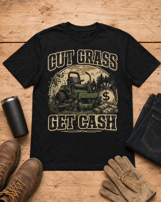 Cut Grass Get Cash Lawn Care Shirt in Black workbench flat lay