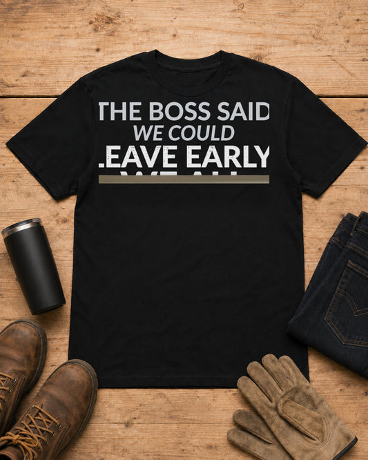 The Boss Said We Could Work Humor Shirt in Black workbench flat lay