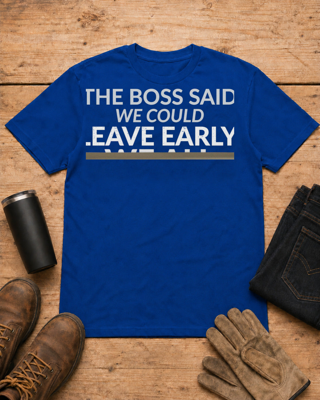 The Boss Said We Could Work Humor Shirt in Royal Blue workbench flat lay