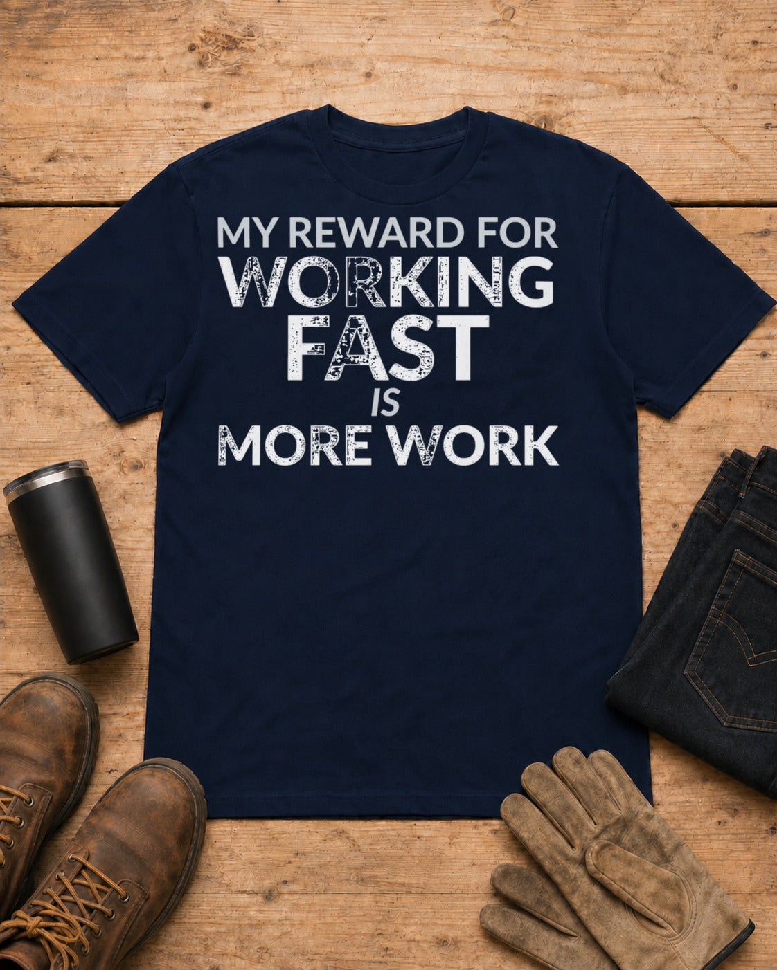 Working Fast Means More Work Funny Employee Shirt in Navy workbench flat lay