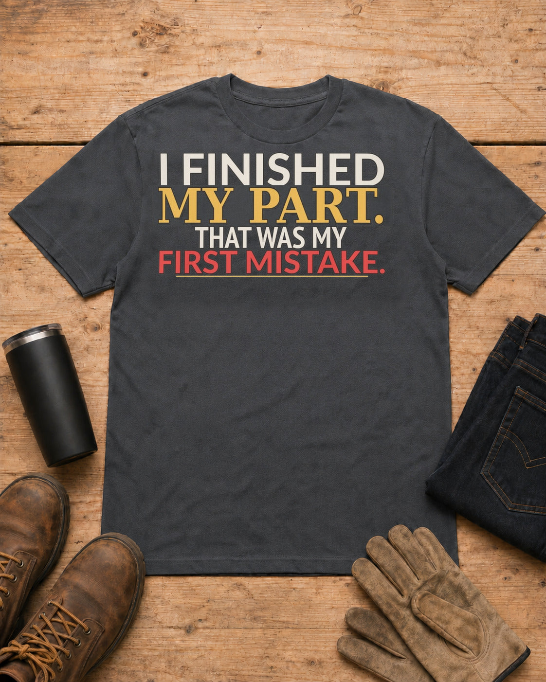 I Finished My Part First Mistake Work Humor Shirt in Dark Heather workbench flat lay