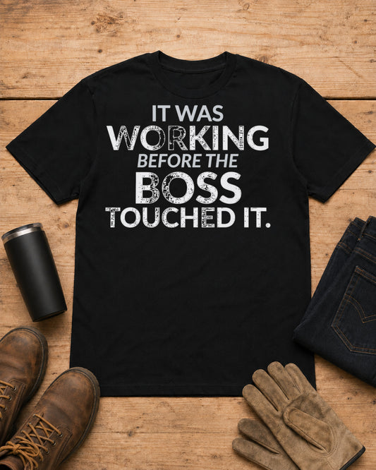 Working Before the Boss Touched It Funny Shirt in Black workbench flat lay