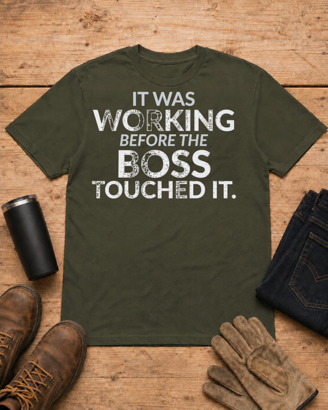 Working Before the Boss Touched It Funny Shirt in Military Green workbench flat lay