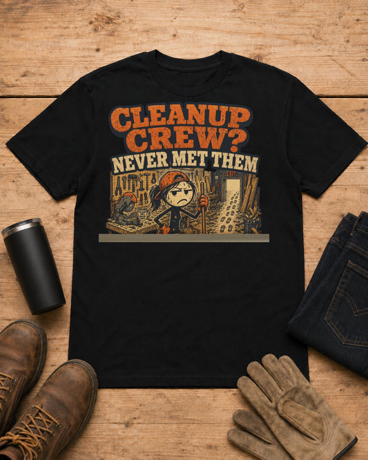 Cleanup Crew Never Met Them Work Humor Shirt in Black workbench flat lay