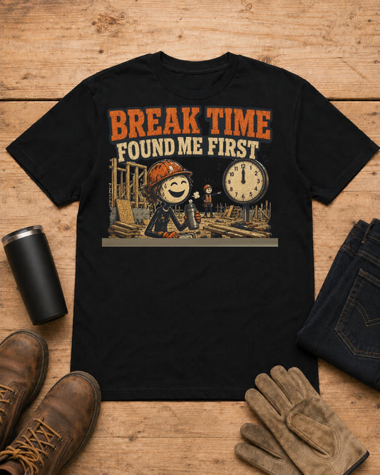 Break Time Found Me First Work Humor Shirt in Black workbench flat lay
