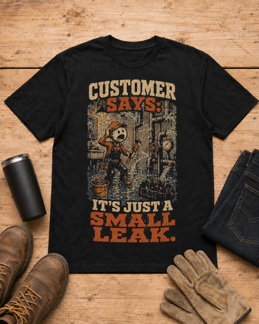 It’s Just a Small Leak Plumber Shirt in Black workbench flat lay