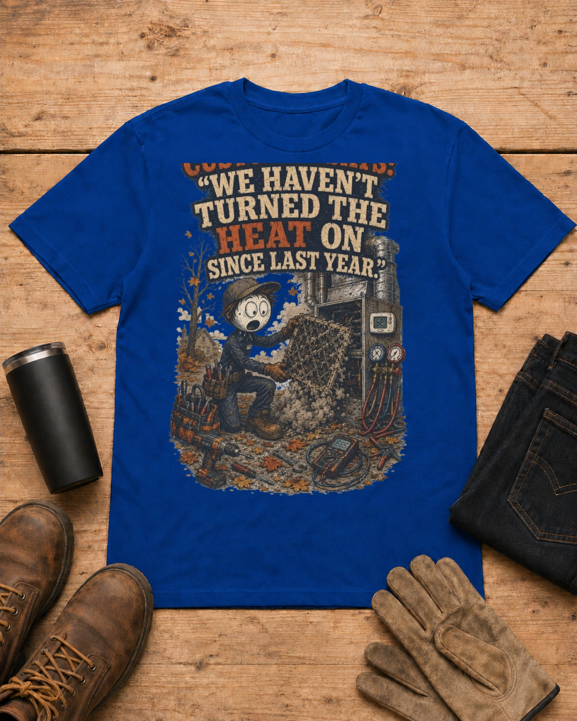 Customer Says: “We Haven’t Turned the Heat On Since Last Year.” | HVAC T-Shirt in Royal Blue workbench flat lay