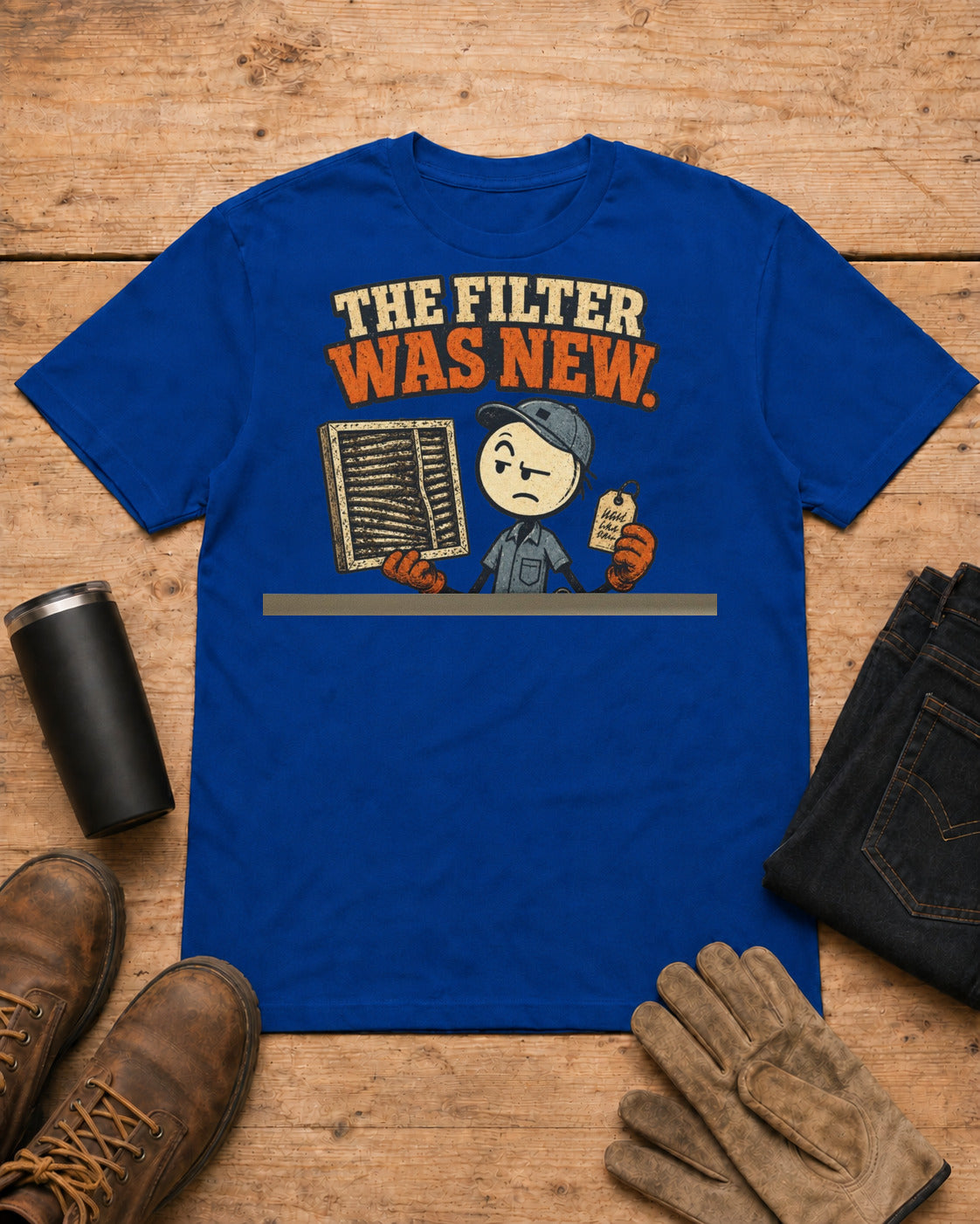 The Filter Was New Funny HVAC T-Shirt in Royal Blue workbench flat lay