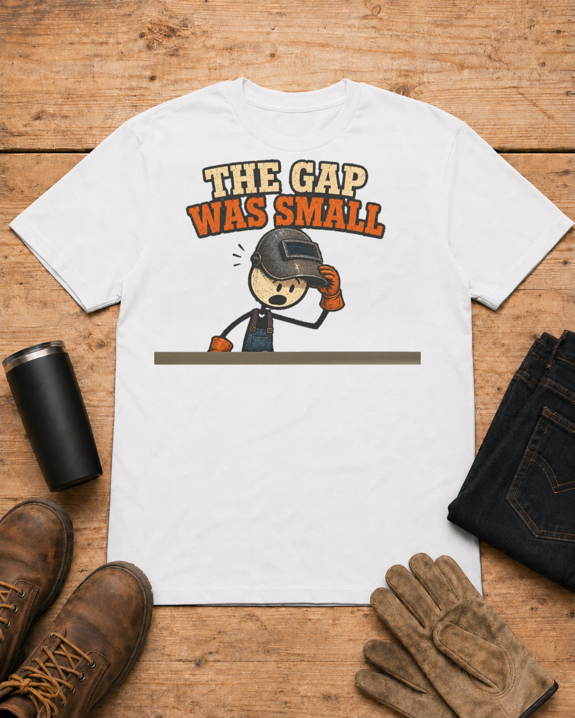 The Gap Was Small Funny Welder T-Shirt in White workbench flat lay