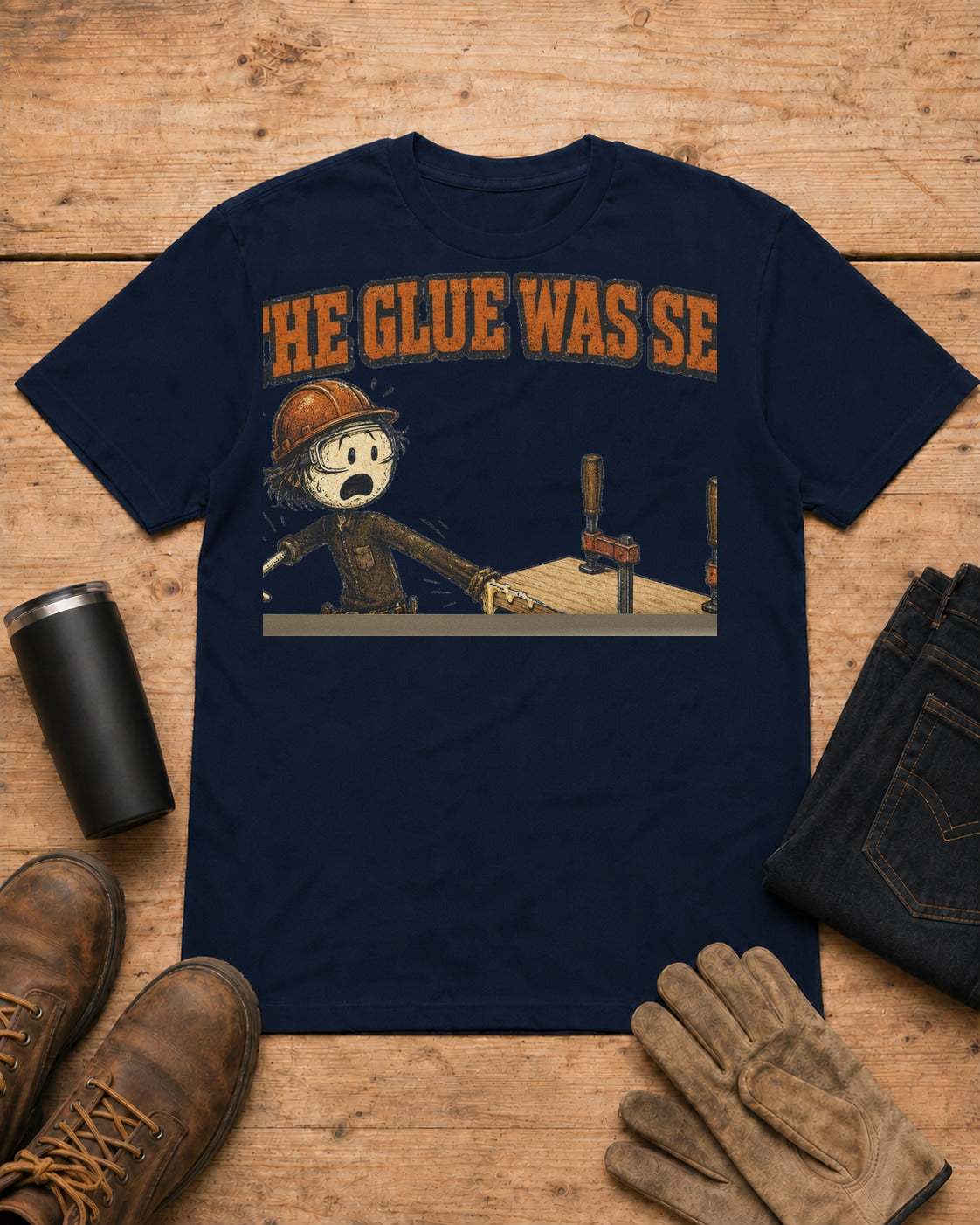 The Glue Was Set Funny Carpenter T-Shirt in Navy workbench flat lay