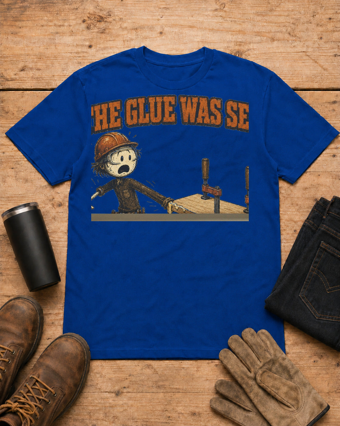 The Glue Was Set Funny Carpenter T-Shirt in Royal Blue workbench flat lay