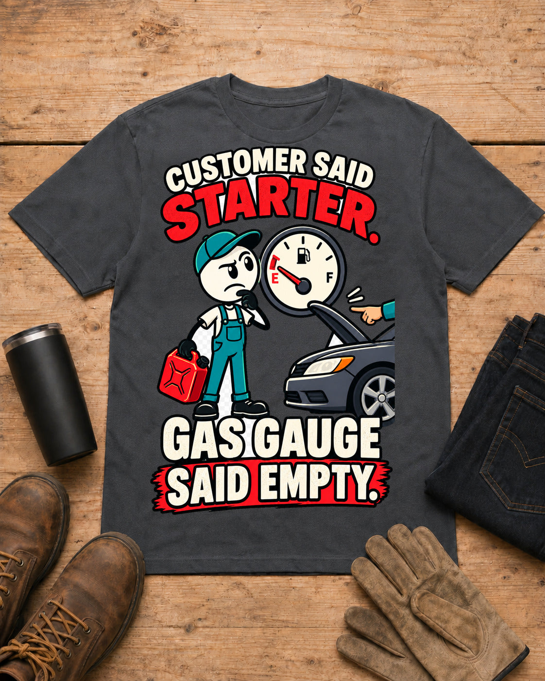 Customer Said Starter. Gas Gauge Said Empty. | Funny Mechanic T-Shirt in Dark Heather workbench flat lay