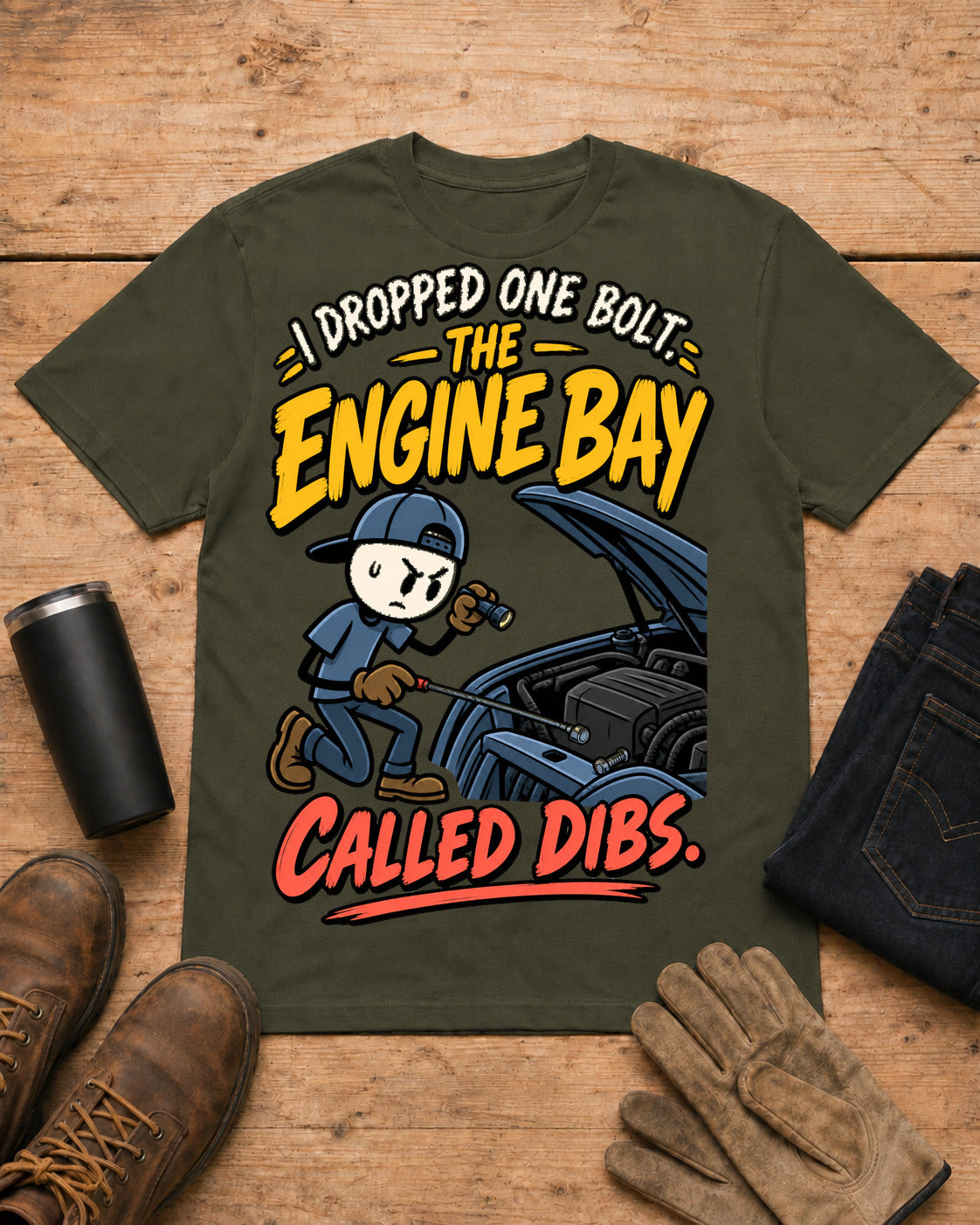 I Dropped One Bolt. The Engine Bay Called Dibs. | Funny Mechanic T-Shirt in Military Green workbench flat lay