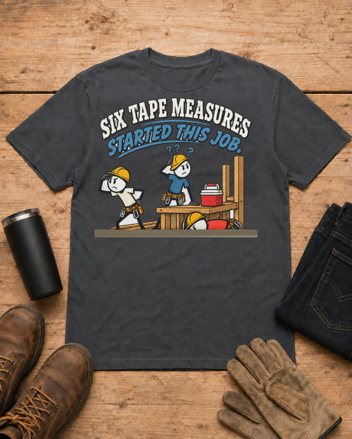 Six Tape Measures Started This Job. Zero Made It to Lunch. | Funny Carpenter T-Shirt in Dark Heather workbench flat lay