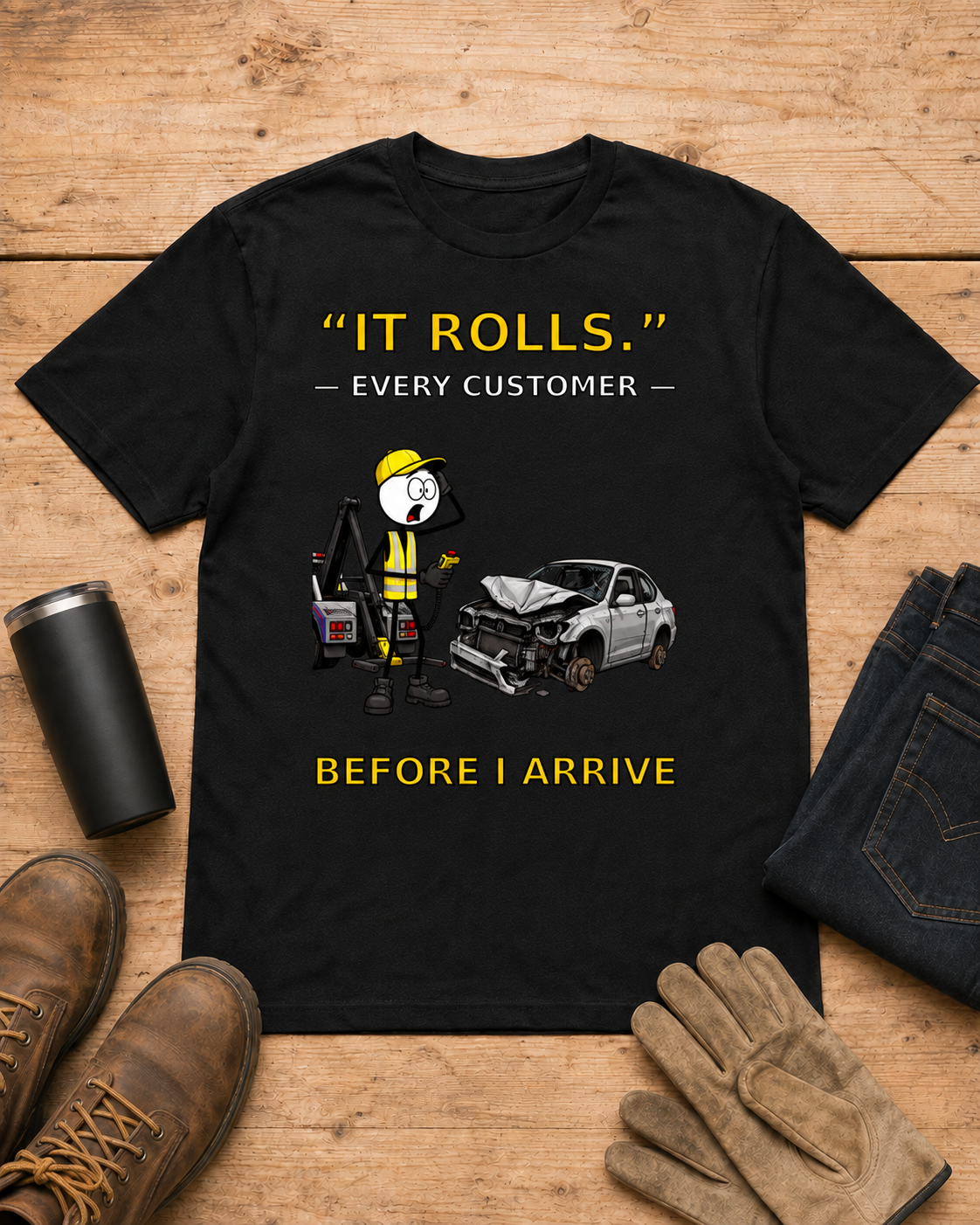 “It Rolls.” — Every Customer Before I Arrive | Tow Truck Driver T-Shirt in Black workbench flat lay