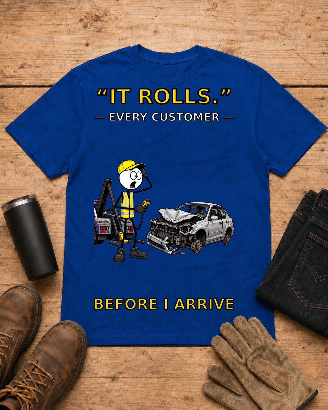 It Rolls Every Customer Before I Arrive Tow Truck T-Shirt in Royal Blue workbench flat lay